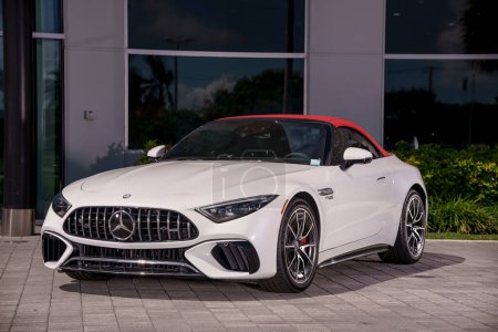 Photo for Fort Lauderdale, FL, USA - October 4, 2023: Stock image 2023 AMG SL 43 55 63 Roadster white with red top - Royalty Free Image