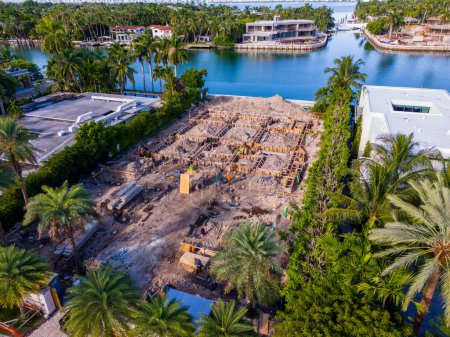 Photo for Miami Beach, FL, USA - October 6, 2023:  Aerial drone photo of a luxury waterfront mansion home under construction on Allison Island Miami Beach Florida - Royalty Free Image