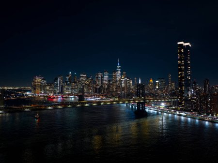 Photo for Night aerials New York City. View of river and bridges lit - Royalty Free Image