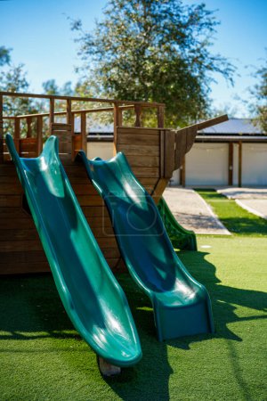Photo for Slides at a childrens playground - Royalty Free Image
