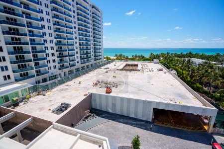 Photo for Miami Beach, FL, USA - April 15, 2024:  Aerial photo of pool deck construction at Roney Palace Hotel Miami Beach Florida - Royalty Free Image