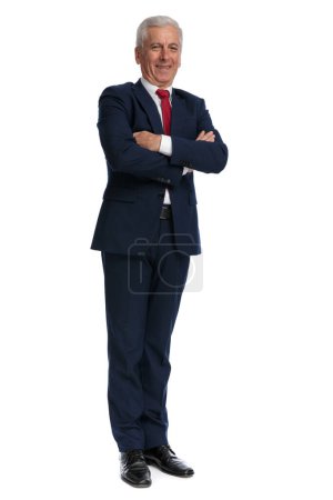 Photo for Full body picture of a old businessman crossing his arms at chest - Royalty Free Image