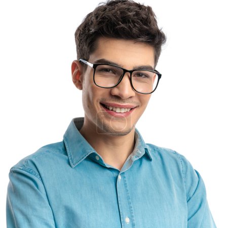 Photo for Portrait of attractive casual man wearing glasses and smiling while standing on white background - Royalty Free Image