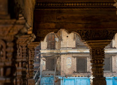 Photo for Wooden carved pillars and arch in the temple of Durbar square at Patan Kathmandu, Nepal. - Royalty Free Image