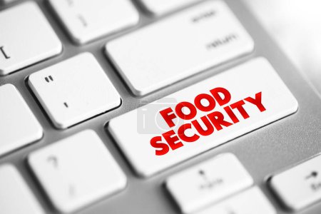 Téléchargez les photos : La sécurité alimentaire est la mesure de la capacité d'une personne à accéder à des aliments nutritifs et suffisants en quantité, bouton de concept de texte sur le clavier - en image libre de droit
