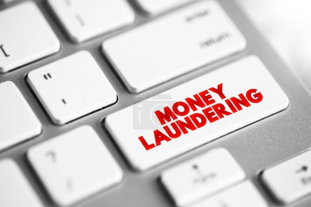 Photo for Money Laundering is the process of concealing the origin of money, obtained from illicit activities, text concept button on keyboard - Royalty Free Image