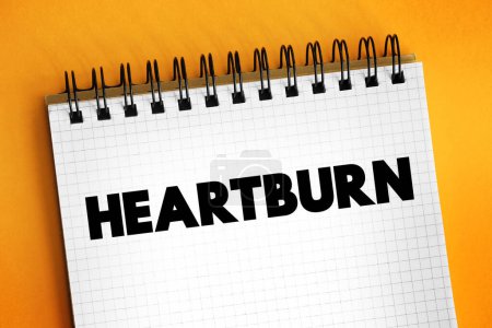 Téléchargez les photos : Heartburn is a burning feeling in the chest caused by stomach acid travelling up towards the throat, text concept background - en image libre de droit