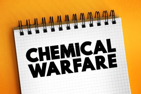 Foto de Guerra química - utilizando las propiedades tóxicas de las sustancias químicas como armas, concepto de texto en el bloc de notas - Imagen libre de derechos