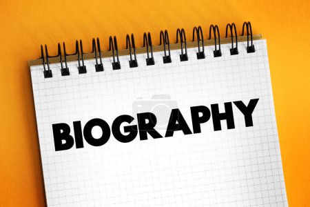 Foto de Biografía es una descripción detallada de la vida de una persona, concepto de texto en el bloc de notas - Imagen libre de derechos