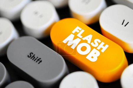 Foto de Flash Mob es un grupo de personas que se reúnen repentinamente en un lugar público, realizan por un breve tiempo, luego se dispersan rápidamente, botón de concepto de texto en el teclado - Imagen libre de derechos