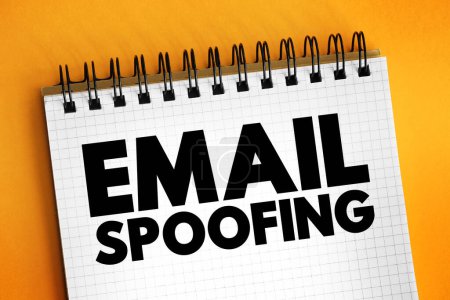 Email Spoofing is the creation of email messages with a forged sender address, text concept on notepad