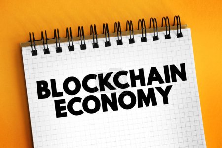 Blockchain Economy - potential future environment in which cryptocurrency replaces current monetary systems, text concept on notepad