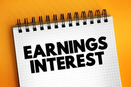 Earnings Interest - money earned by an individual or company for lending their funds, text concept on notepad