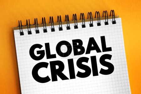Crise mondiale - de graves dommages sont causés à l "économie mondiale, et en particulier aux personnes vulnérables et aux pays en développement, concept de texte sur bloc-notes