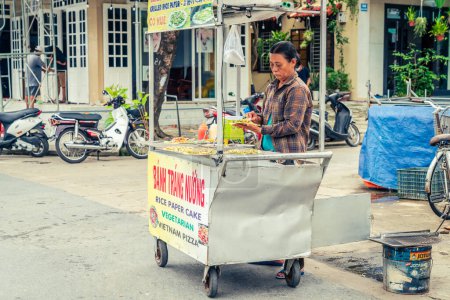 Photo for Hoi An, Vietnam, November 20, 2022: Food cart at a street market in the town of Hoi An, Vietnam - Royalty Free Image