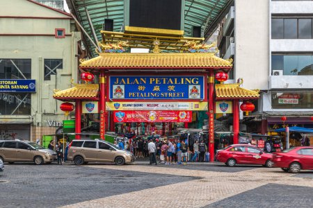 Photo for January 9, 2023: Entrance gate of petaling street, a Chinatown located in Kuala Lumpur, Malaysia. In the late 19th and early 20th Century it had been a commercial center with an important tapioca mill - Royalty Free Image