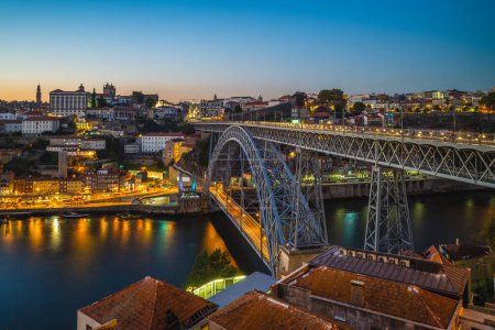 Photo for Dom Luiz bridge over river douro at porto in portugal at night - Royalty Free Image