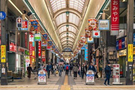 Photo for June 4, 2023: Tanukikoji Shopping Arcade, one of the oldest shopping streets in Sapporo, Hokkaido, Japan started in 1873.  It stretches 900 meters from east to west with some 200 different shops. - Royalty Free Image