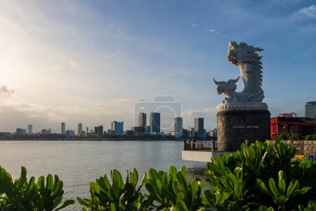 Photo for Dragon carp statue and the skyline of danang in vietnam - Royalty Free Image