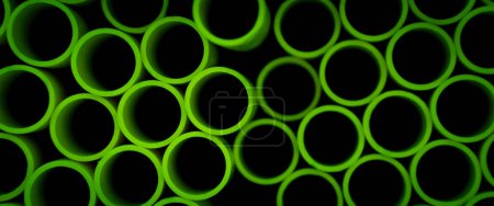 Photo for Background of the green plastic pipes in stacked. - Royalty Free Image