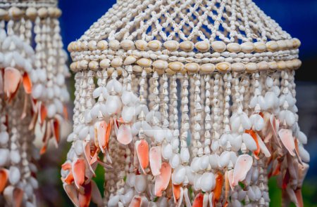 Photo for Handmade souvenir decorated with different sea shells. - Royalty Free Image