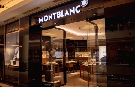 Photo for KUALA LUMPUR, MALAYSIA - DECEMBER 04, 2022: Montblanc brand retail shop logo signboard on the storefront in the shopping mall. - Royalty Free Image