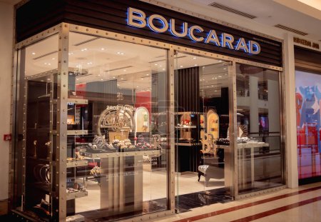 Foto de KUALA LUMPUR, MALAYSIA - DECEMBER 04, 2022: Boucarad brand retail shop logo signboard on the storefront in the shopping mall. - Imagen libre de derechos