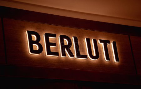 Photo for KUALA LUMPUR, MALAYSIA - DECEMBER 04, 2022: Berluti brand retail shop logo signboard on the storefront in the shopping mall. - Royalty Free Image