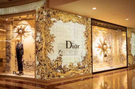 Photo for KUALA LUMPUR, MALAYSIA - DECEMBER 04, 2022: Dior brand retail shop logo signboard on the storefront in the shopping mall. - Royalty Free Image