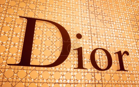 Photo for KUALA LUMPUR, MALAYSIA - DECEMBER 04, 2022: Dior brand retail shop logo signboard on the storefront in the shopping mall. - Royalty Free Image