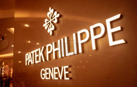 Photo for KUALA LUMPUR, MALAYSIA - DECEMBER 04, 2022: Patek Philippe brand retail shop logo signboard on the storefront in the shopping mall. - Royalty Free Image