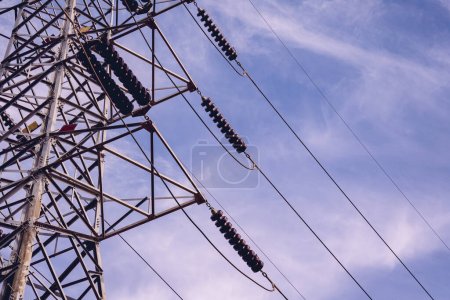 Photo for Structure pattern view of high voltage pole power transmission tower. - Royalty Free Image