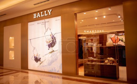Photo for KUALA LUMPUR, MALAYSIA - DECEMBER 04, 2022: Bally brand retail shop logo signboard on the storefront in the shopping mall. - Royalty Free Image