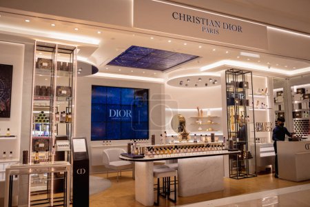 Photo for KUALA LUMPUR, MALAYSIA - DECEMBER 04, 2022: Christian Dior brand retail shop logo signboard on the storefront in the shopping mall. - Royalty Free Image