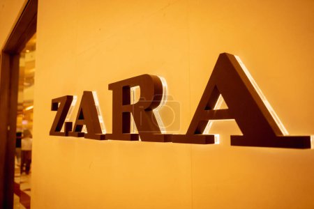 Photo for KUALA LUMPUR, MALAYSIA - DECEMBER 04, 2022: Zara brand retail shop logo signboard on the storefront in the shopping mall. - Royalty Free Image