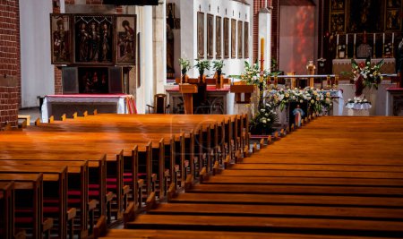 Photo for Rows of church benches at the old european catholic church - Royalty Free Image
