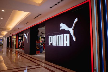 Photo for KUALA LUMPUR, MALAYSIA - DECEMBER 04, 2022: Puma brand retail shop logo signboard on the storefront in the shopping mall. - Royalty Free Image