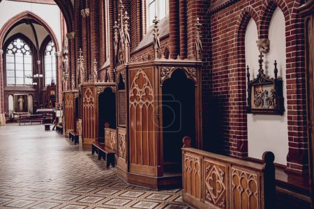 Photo for Row of confessionals booth of old european catholic church - Royalty Free Image