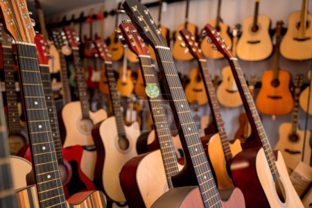 Photo for Many rows of classical guitars in the music shop. - Royalty Free Image