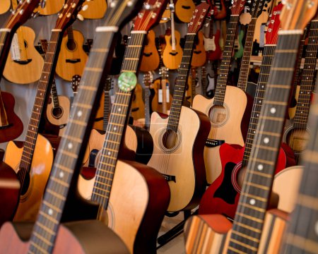 Photo for Many rows of classical guitars in the music shop. - Royalty Free Image