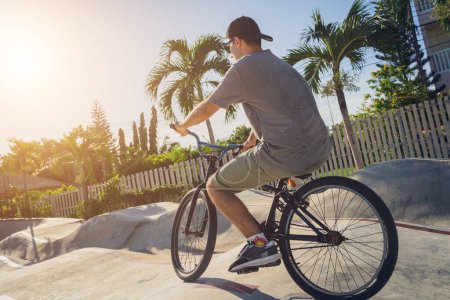 Photo for Happy young man enjoy BMX riding at the skatepark. - Royalty Free Image