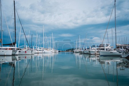 Photo for Many white modern yachts moored at the pier of marina - Royalty Free Image