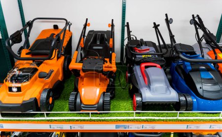Photo for Showcase of new powerful gasoline lawn mowers - Royalty Free Image