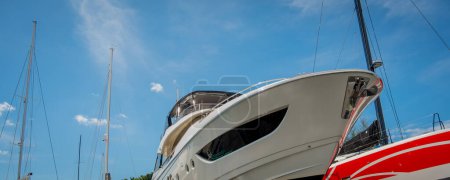Photo for Motor yacht moored for repairs and service in dry dock. - Royalty Free Image