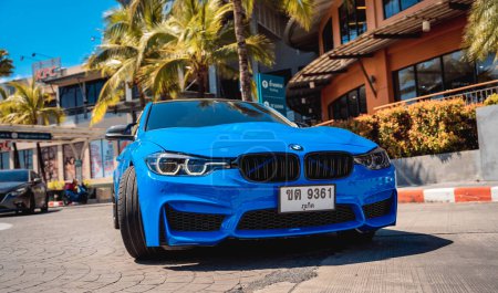 Photo for PHUKET, THAILAND- DECEMBER 25, 2023: Beautiful bright blue BMW M3 series in the parking lot - Royalty Free Image