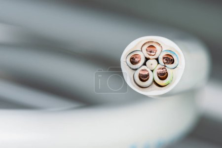 Macro view three-phase electric cables used to installation in commercial and industrial electrical systems