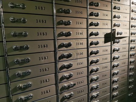 Photo for Old safe deposit boxes in the bank as very nice background - Royalty Free Image