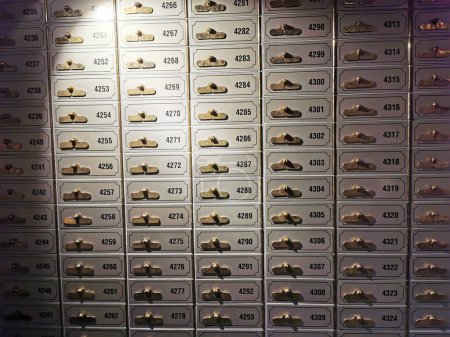 Photo for Old safe deposit boxes in the bank as very nice background - Royalty Free Image