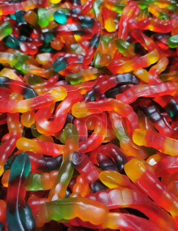 Photo for Jelly unhealthy candy worms as nice color food background - Royalty Free Image