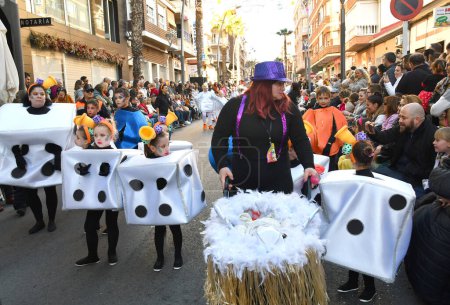 TORREVIEJA, SPAIN  February 4, 2024: Participants of Annual Carnival Parade. Mardi Gras in Spain